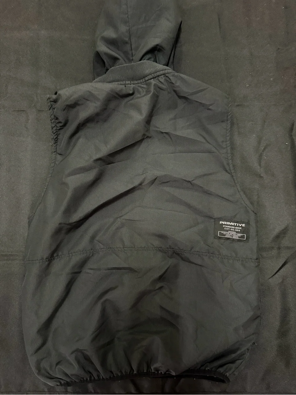 Primitive Black Hooded Utility Vest with Chest Logo